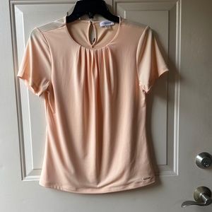 Calvin Klein Short Sleeves Pink Color Top. New without tag.
